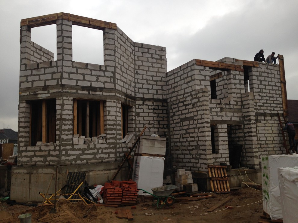 Возведение стен коттеджа проект одноквартирного дома в Королеве