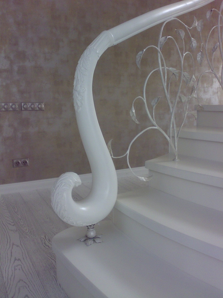 Кованые перила на лестницу в КП Третья Охота в Подмосковье