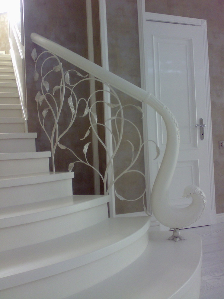 Кованые перила на лестницу в КП Третья Охота в Подмосковье