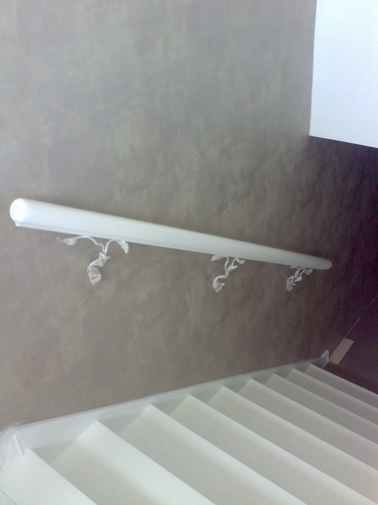 Кованые перила на лестницу в КП Третья Охота в Подмосковье