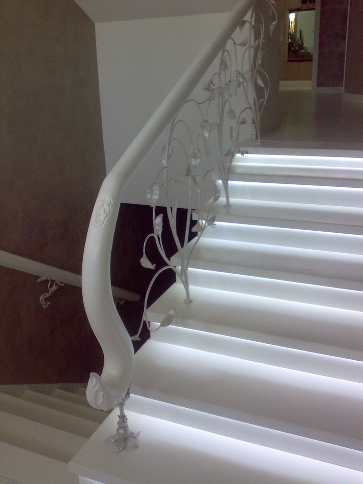 Кованые перила на лестницу в КП Третья Охота в Подмосковье