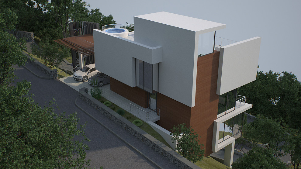 the two-stories from the roadside and the three-stories house from the sea side