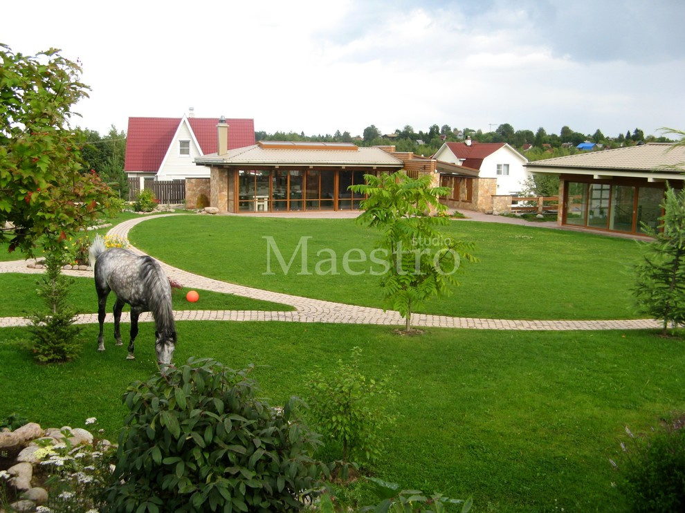 Обложка проекта: Двухуровневый участок, загон для лошади и пруды из природного камня в Токсово