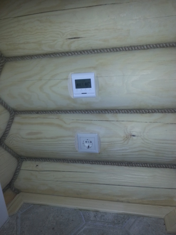 Электромонтажные работы в домах из оцилиндрованного бревна.