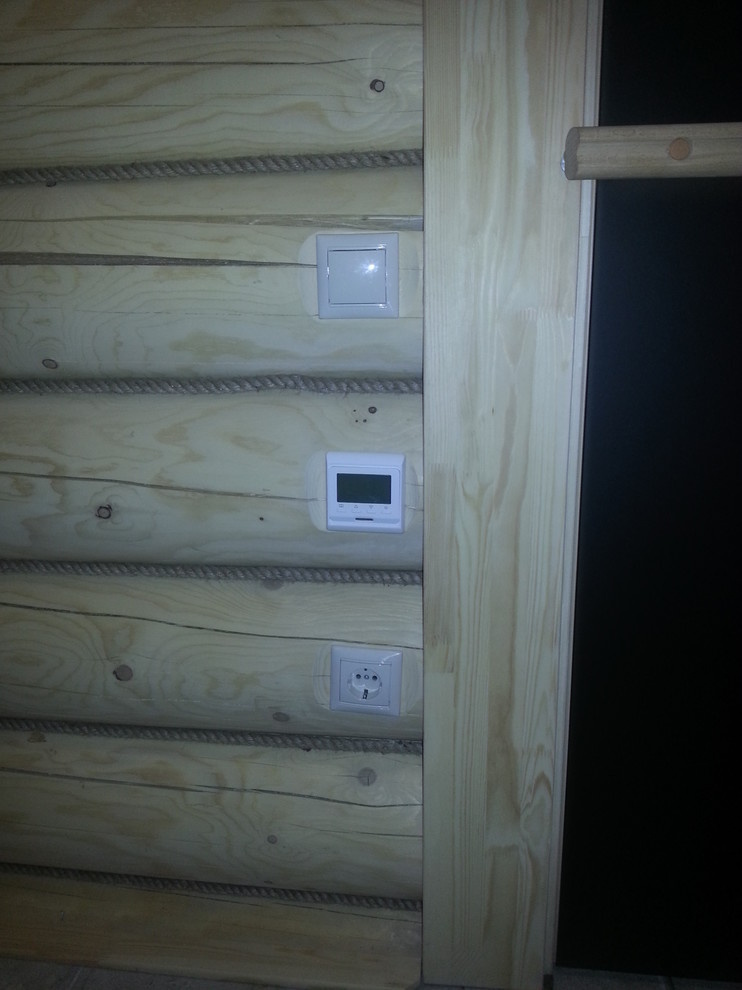 Электромонтажные работы в домах из оцилиндрованного бревна.