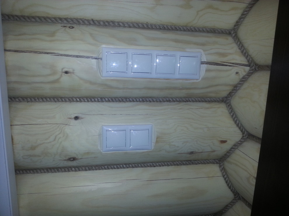 Электромонтажные работы в домах из оцилиндрованного бревна.