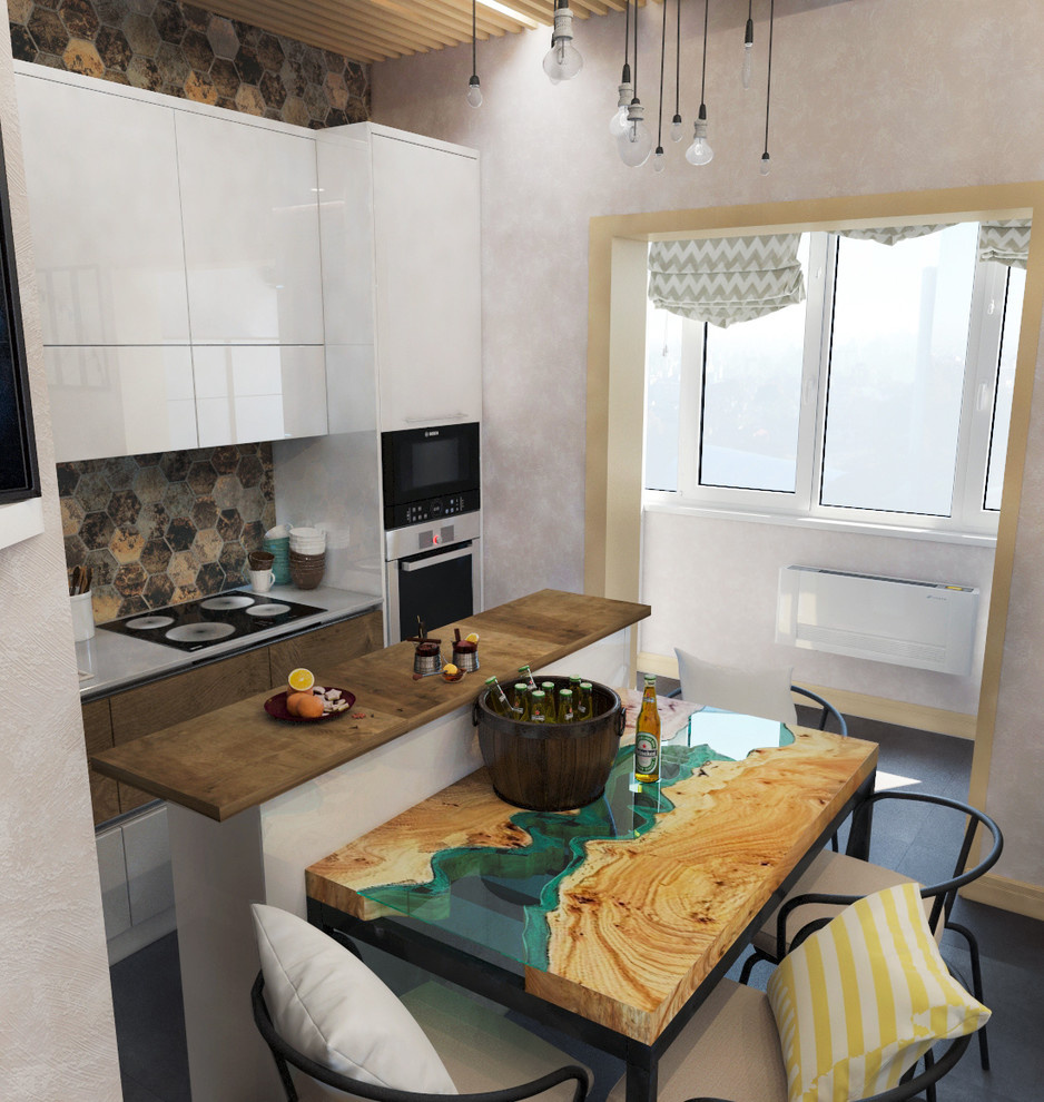 Объединённая кухня-гостиная в квартире молодого холостяка