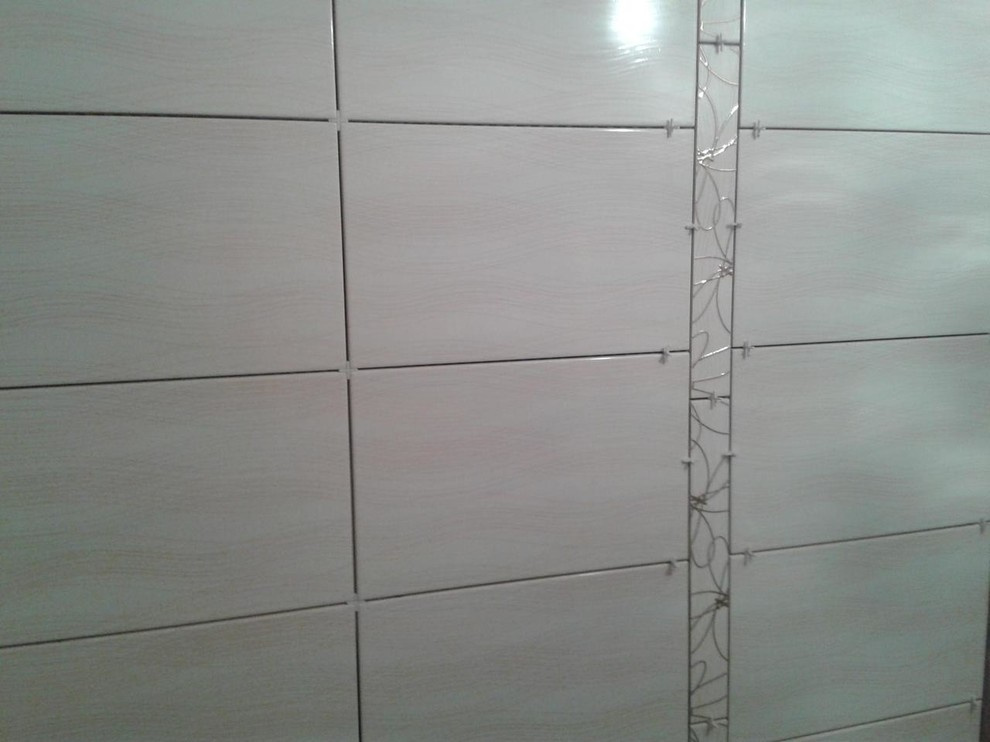 Укладка плитки в ванной комнате. Москва.