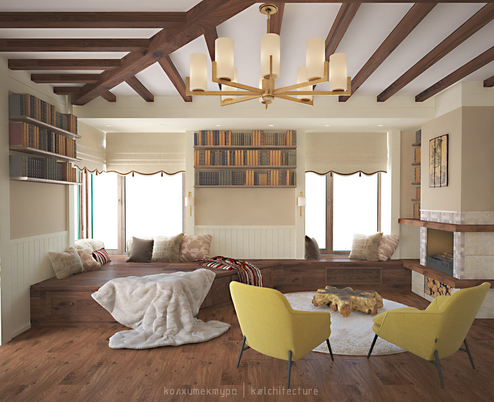 Гостиная зона с камином. Загородное домовладение из двух сообщающихся коттеджей.