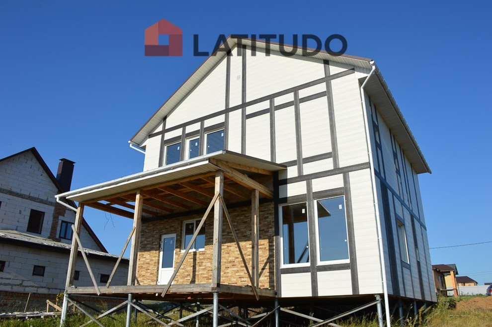 Обшивка фасада фиброцементным сайдингом Cedral и панелями KMEW