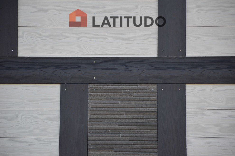 Обшивка фасада фиброцементным сайдингом Cedral и панелями KMEW