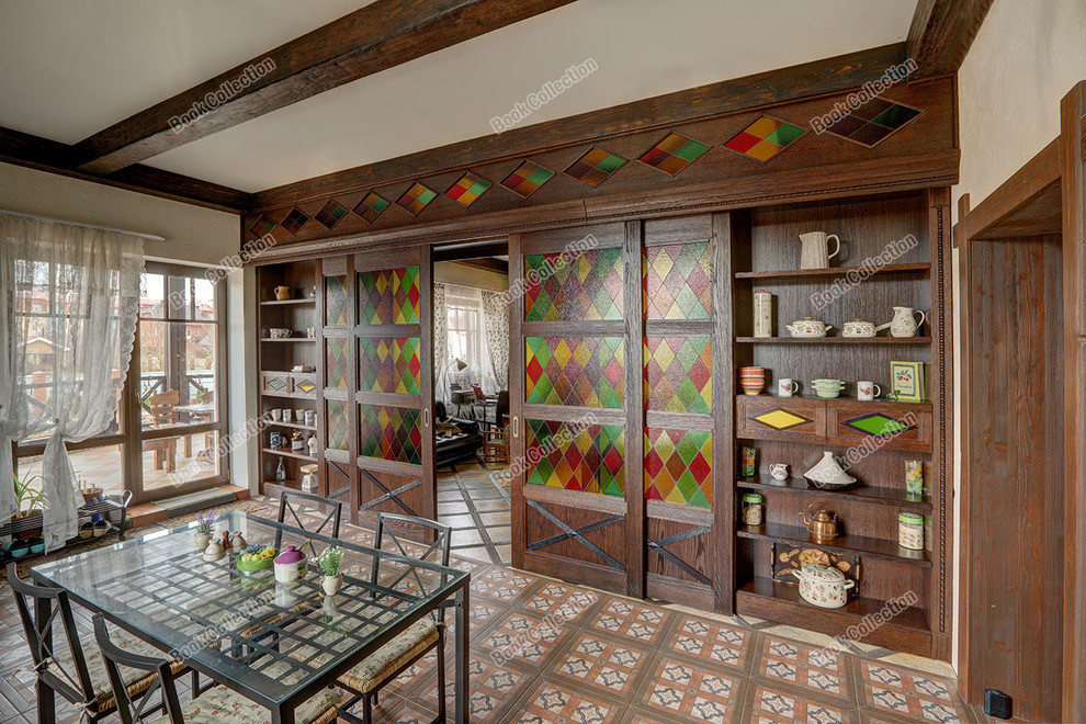 Стеллаж - перегородка из массива и шпона с раздвижными дверьми в коттедж