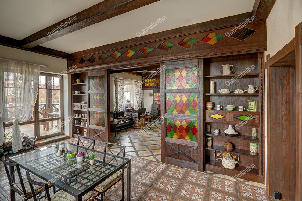 Стеллаж - перегородка из массива и шпона с раздвижными дверьми в коттедж