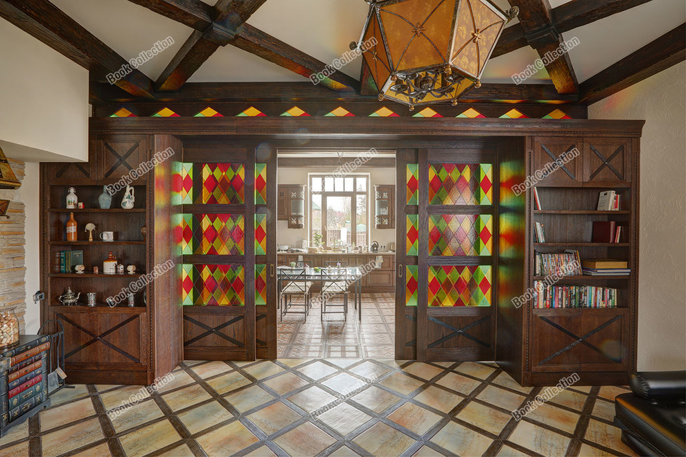 Стеллаж - перегородка из массива и шпона с раздвижными дверьми в коттедж