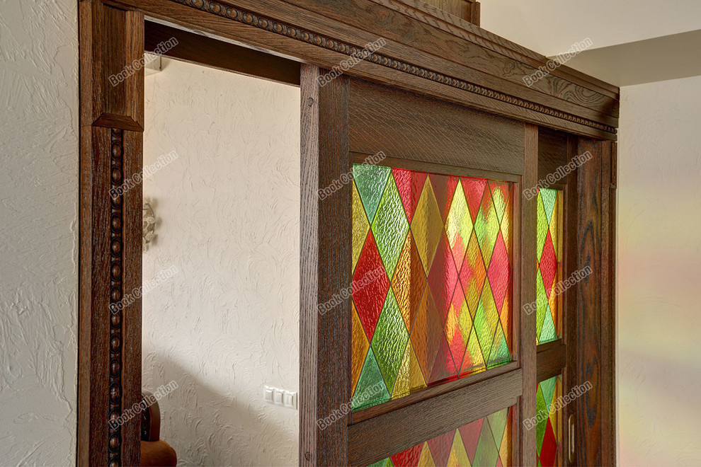 Стеллаж - перегородка из массива и шпона с раздвижными дверьми в коттедж