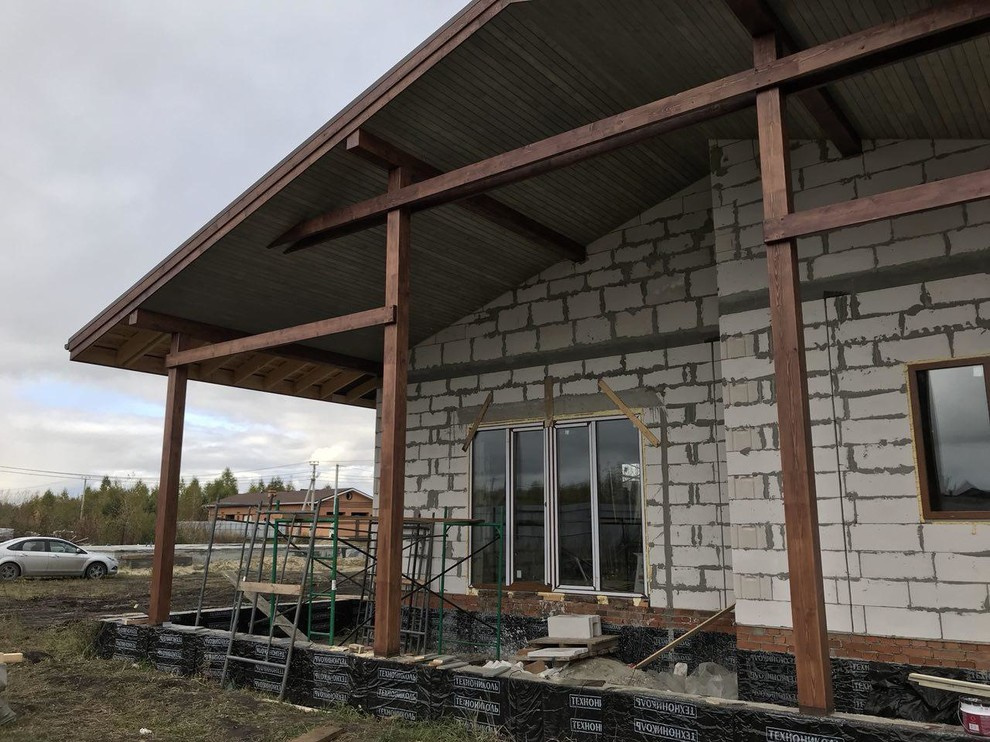 Дом с гаражом в стиле шале