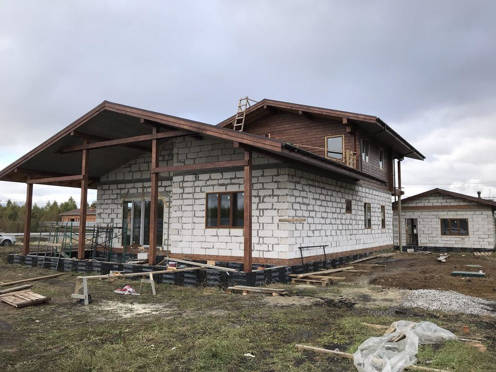 Дом с гаражом в стиле шале