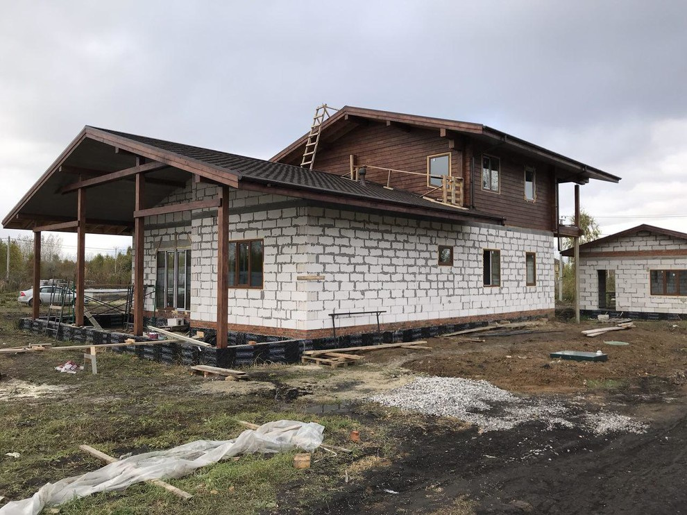 Дом с гаражом в стиле шале