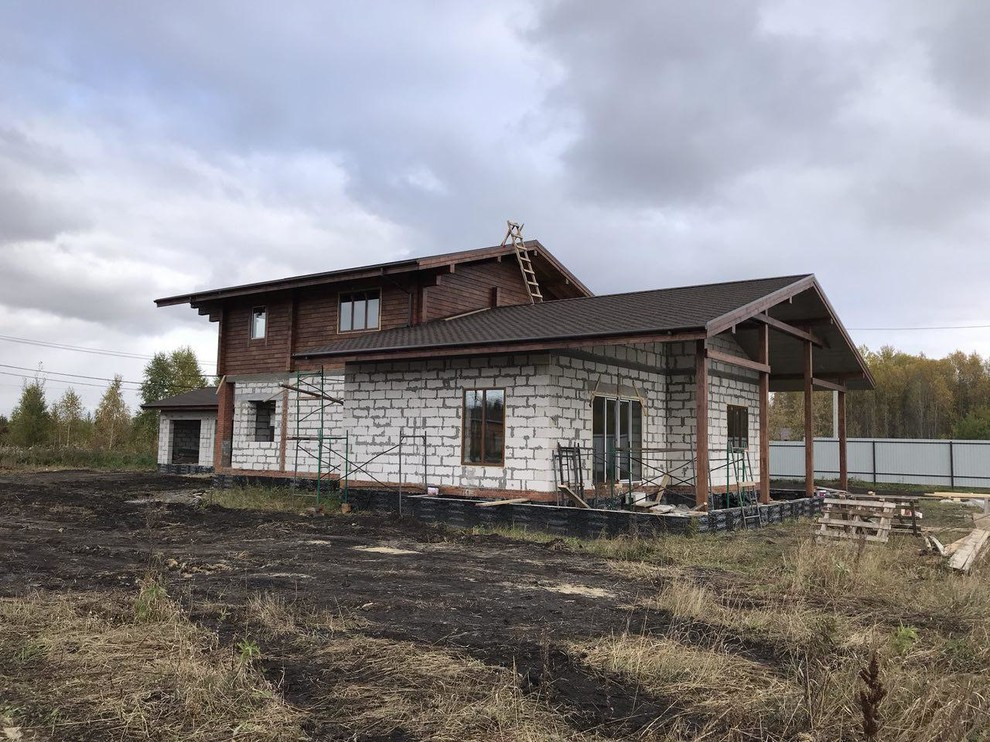 Дом с гаражом в стиле шале