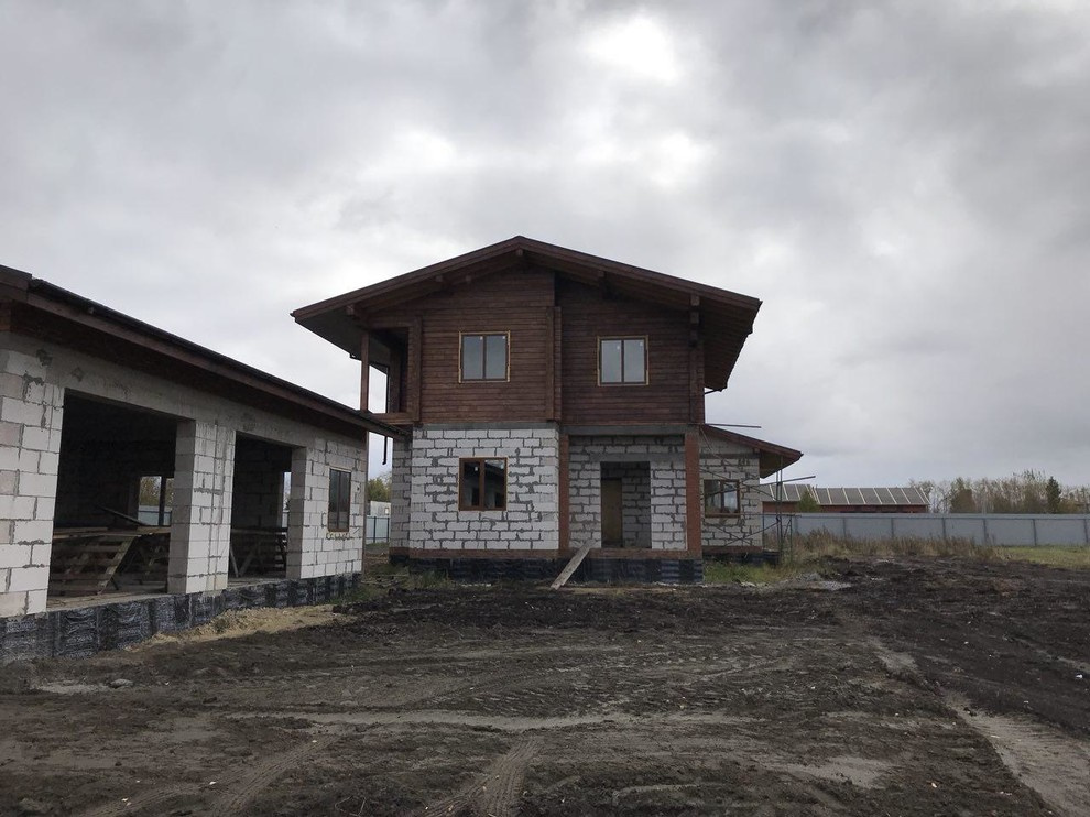 Дом с гаражом в стиле шале