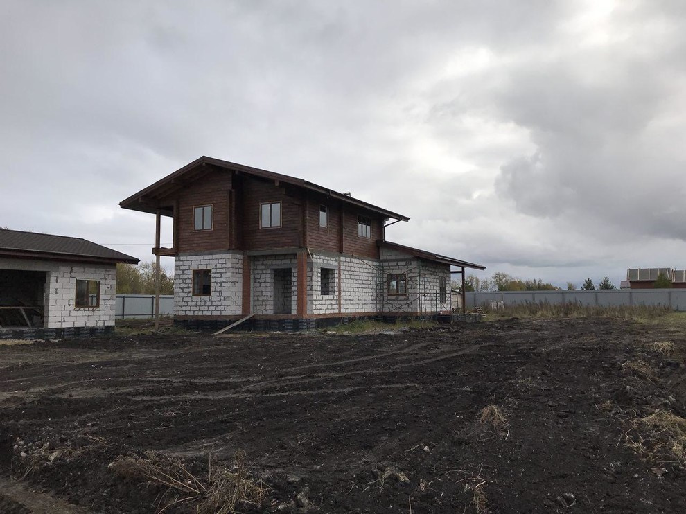 Дом с гаражом в стиле шале