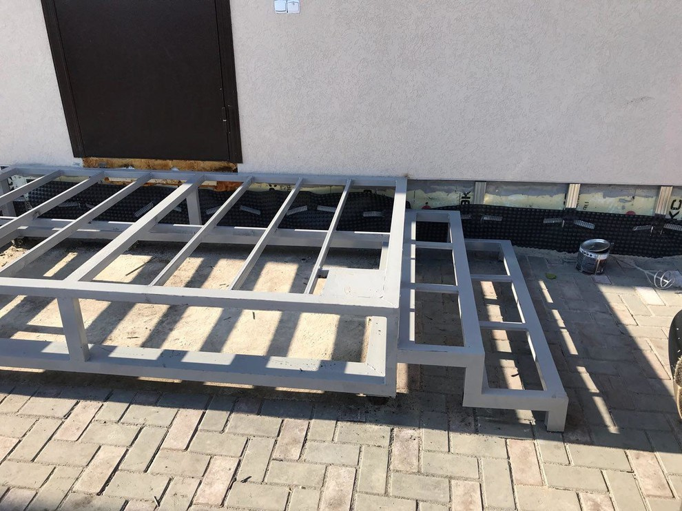 Дом из керамзитоблока со штукатуренным фасадом