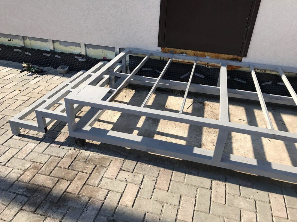 Дом из керамзитоблока со штукатуренным фасадом