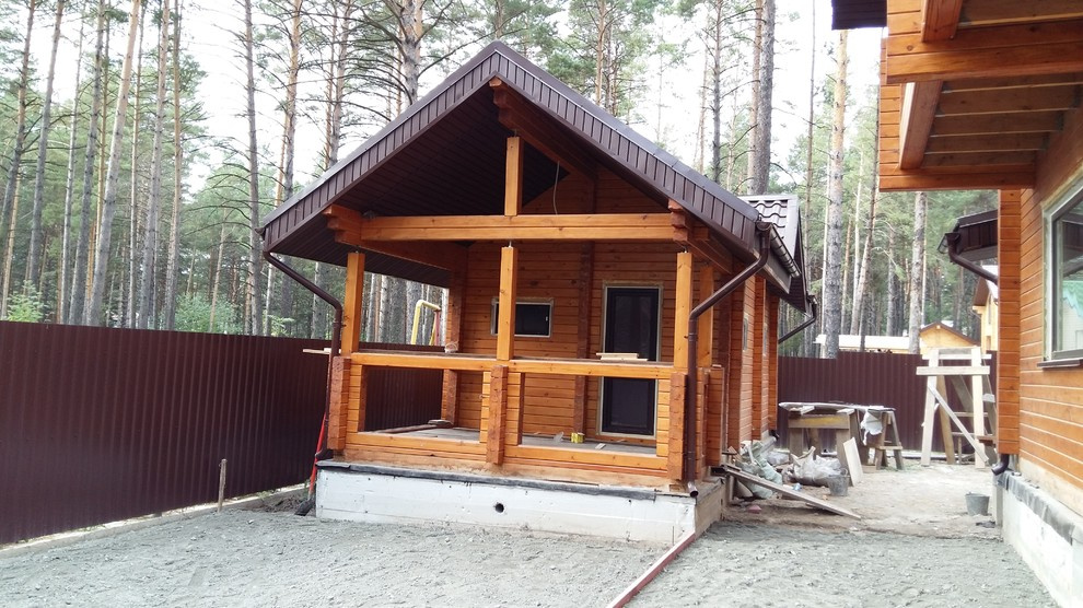 Строительство. Дом из клееного бруса с гаражом и баней.