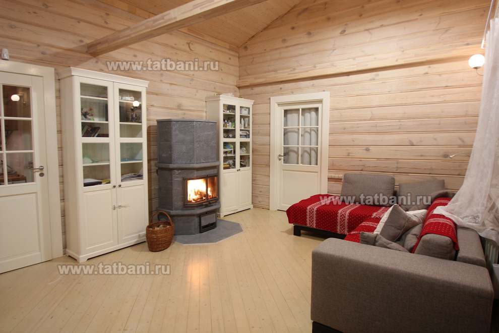 Установка камина Tulikivi в доме из бруса