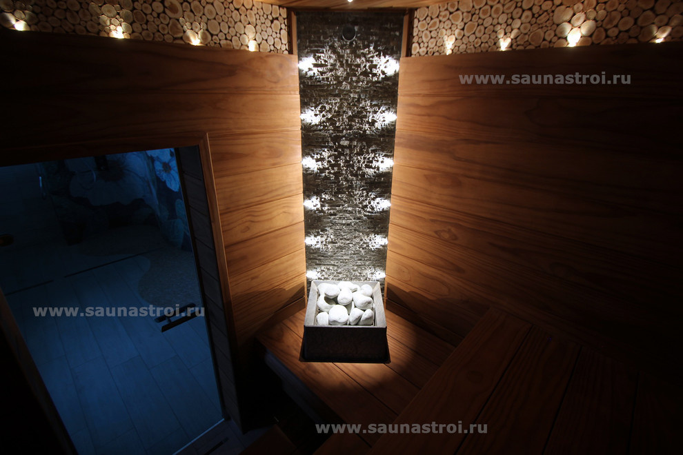 Сауна. Трехъярусный полок из "Pino Premio" и "Tulikivi Tuisku"