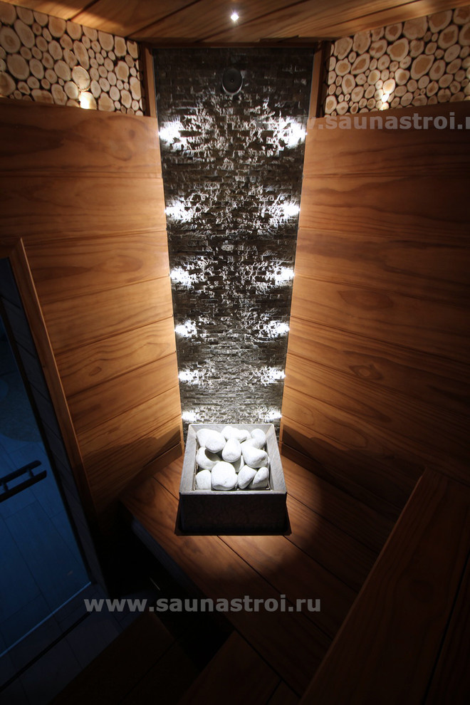 Сауна. Трехъярусный полок из "Pino Premio" и "Tulikivi Tuisku"