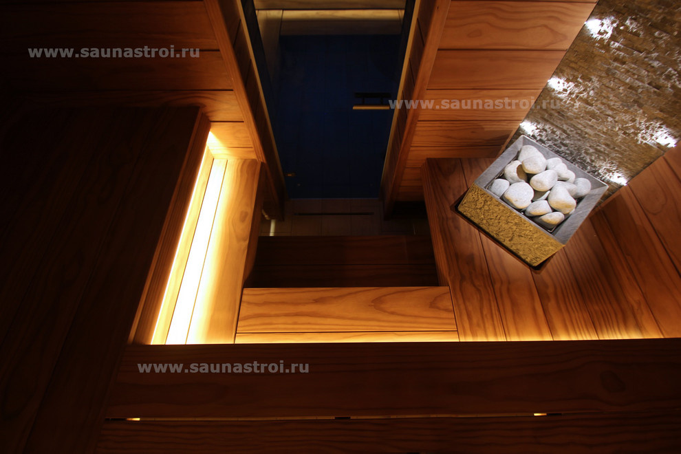 Сауна. Трехъярусный полок из "Pino Premio" и "Tulikivi Tuisku"