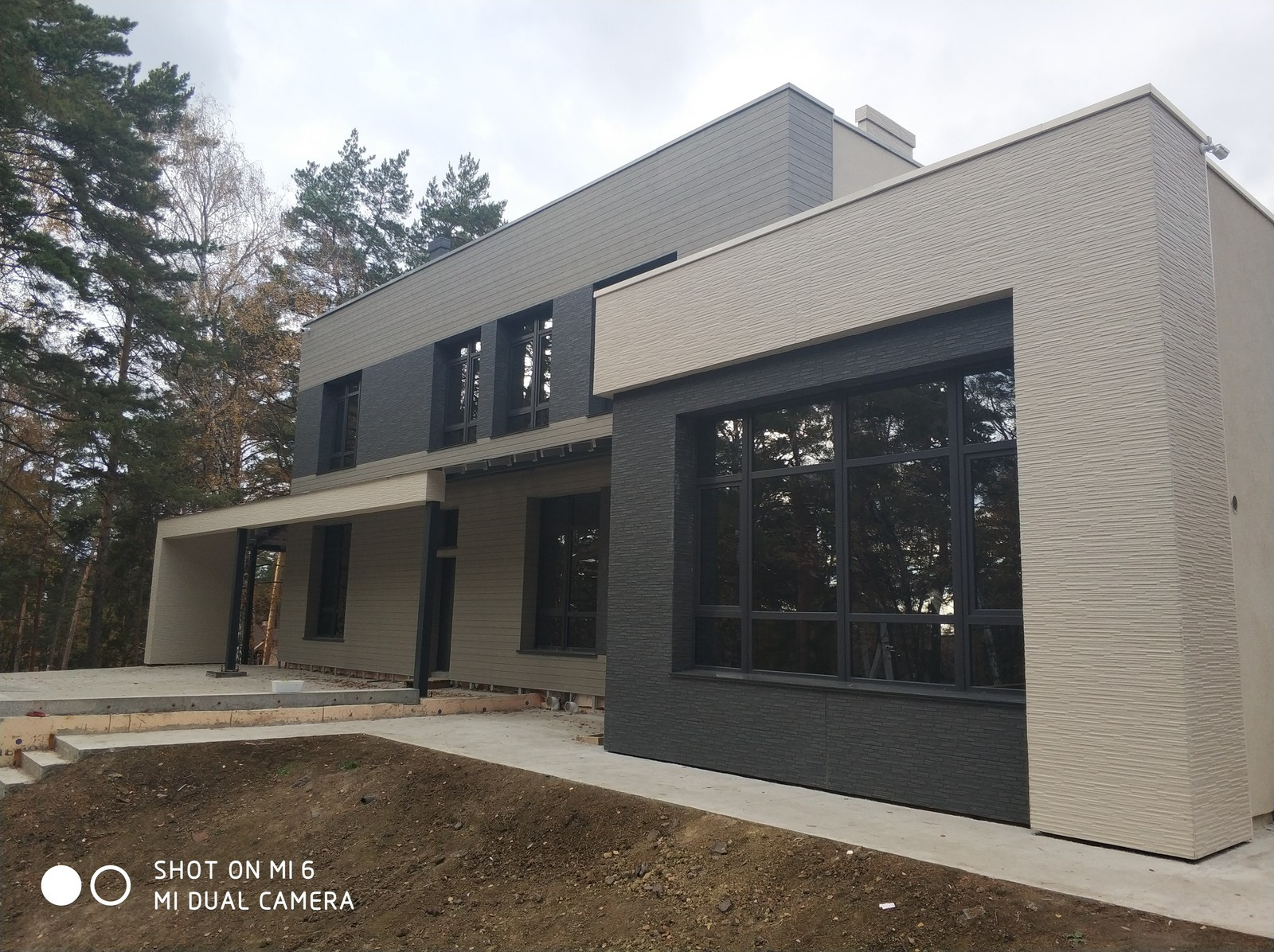 Облицовка фасада фиброцементными панелями