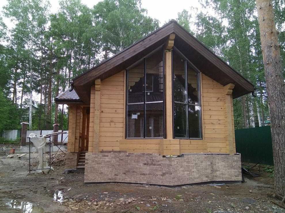 плитка stroeher на фасаде деревянного дома