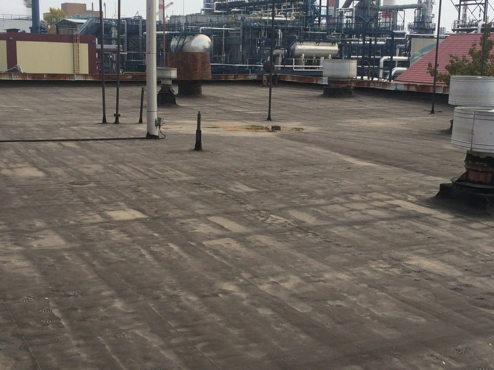 Гидроизоляция кровли производственных строений МНПЗ "Газпромнефть"