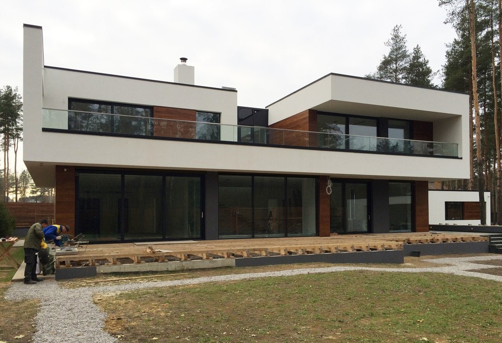 Дом в Ленинградской области. Отделка фасадов термоясенем.