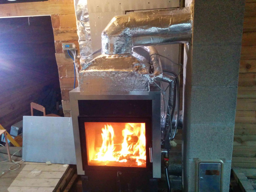 Каминная топка Hoxter c водным контуром в частном доме