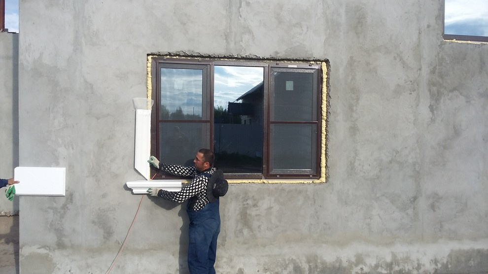 Отделка фасада декоративной штукатуркой