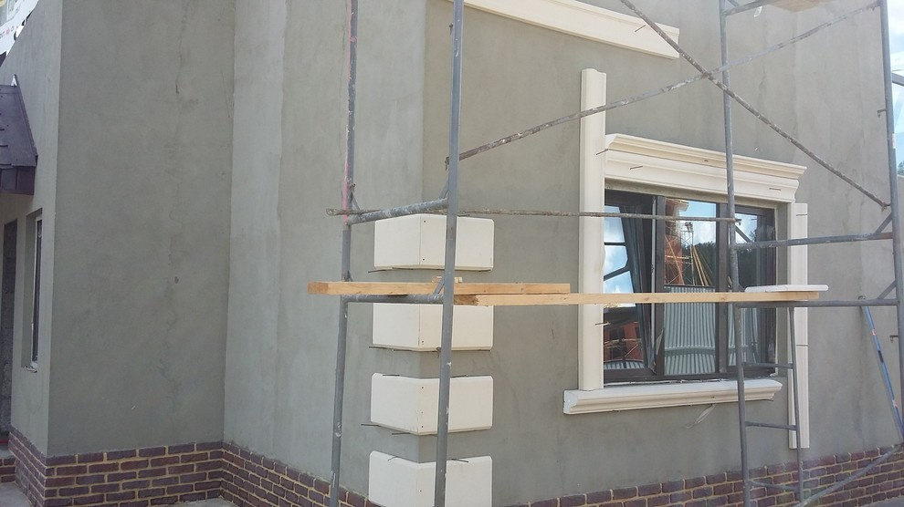 Отделка фасада декоративной штукатуркой