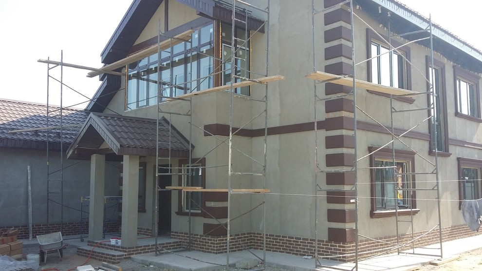 Отделка фасада декоративной штукатуркой