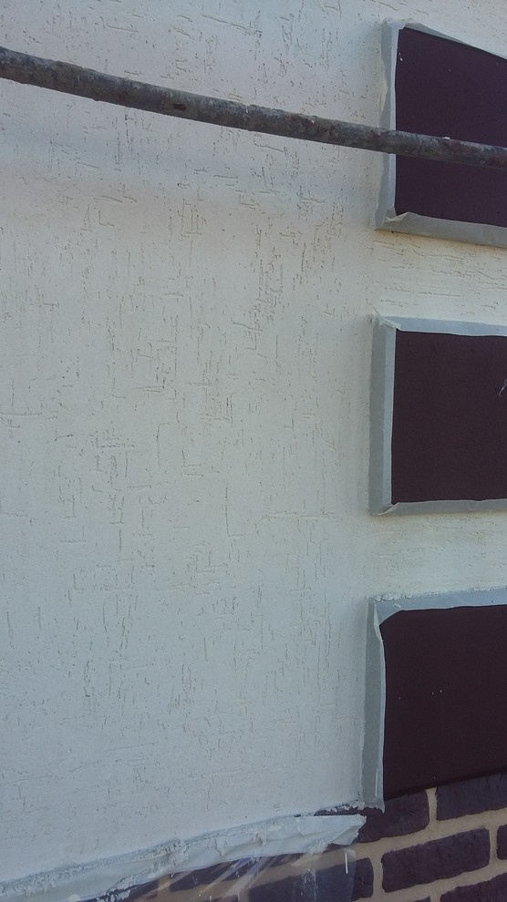 Отделка фасада декоративной штукатуркой