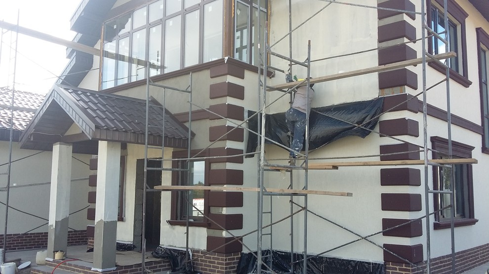 Отделка фасада декоративной штукатуркой