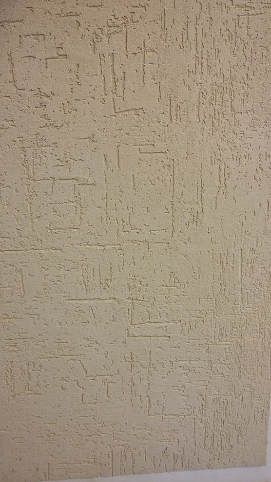 Отделка фасада декоративной штукатуркой