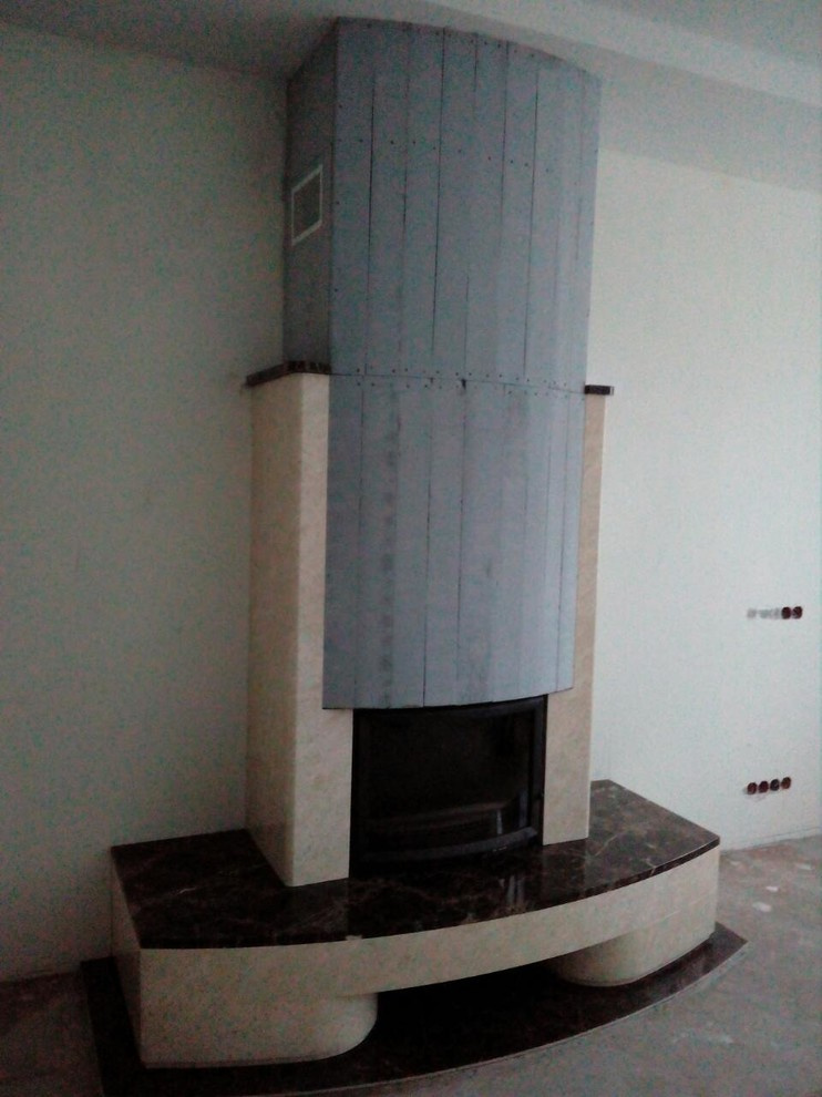 Обложка проекта: Выполненный полностью из мрамора камин с панорамной топкой