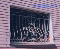 Кованые решетки на окна с пузом