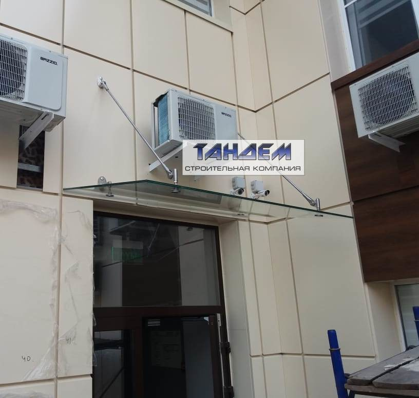 Изготовление и монтаж Стеклянных козырьков