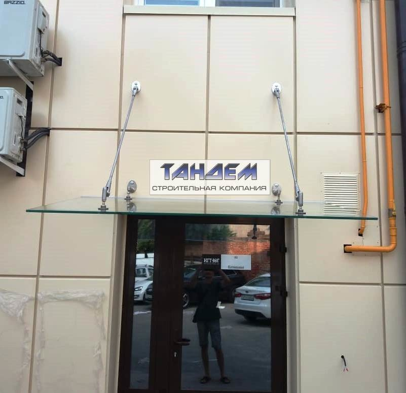 Изготовление и монтаж Стеклянных козырьков