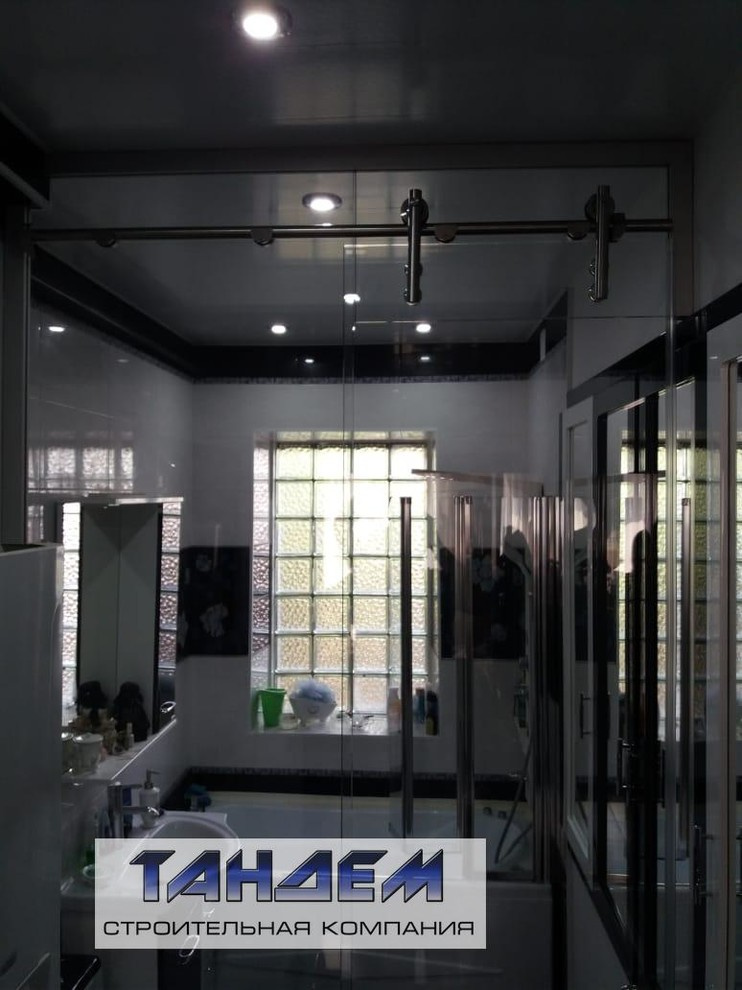 Изготовление и установка Цельностеклянной перегородки Tandem-Кристалл с откатной