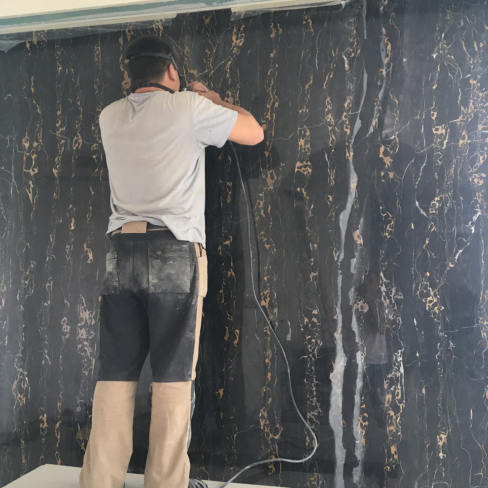 Обложка проекта: Панно из полудрагоценного мрамора с подъемом альпинистами на 12 этаж