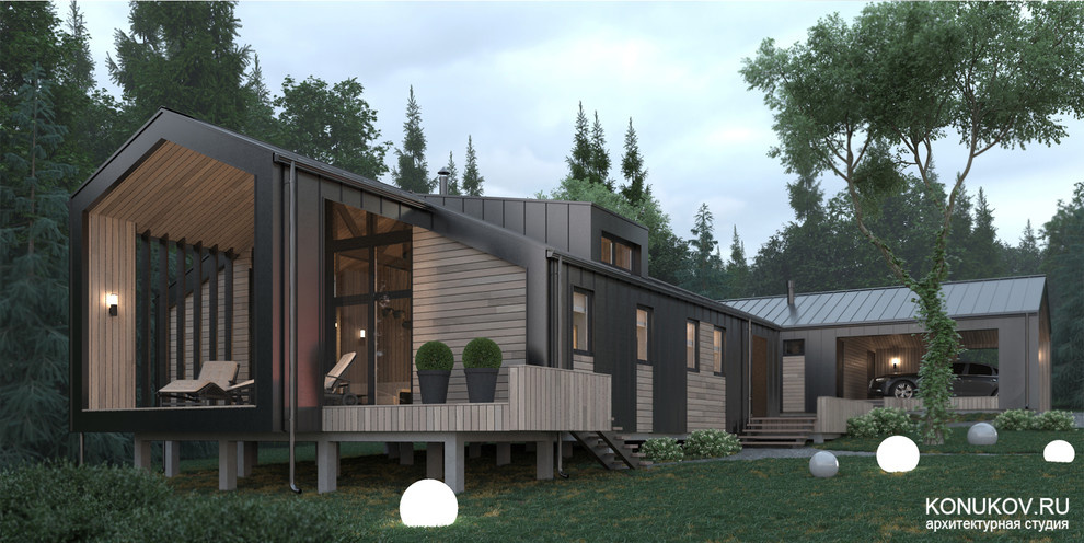 Модульный каркасный дом в современном стиле с гаражом /Архитектор konukov.ru/